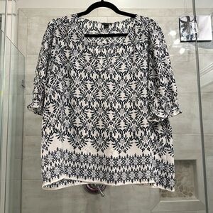 Navy on white v-neck blouse